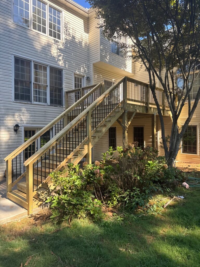 Finished wood deck and railings at an Alpharetta home.
